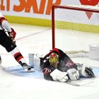 Ottawa Senators goalie Joonas Korpisalo stretches to make a save vs. NJ Devils, Dec. 29, 2023 